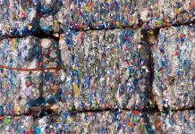 Compacted recyclable plastic waste at a recycling plant.