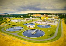 Aerial view of public sewage treatment plant for 165, 000 inhabitants of Pilsen city in Czech Republic, Europe. Environment and industry from above.